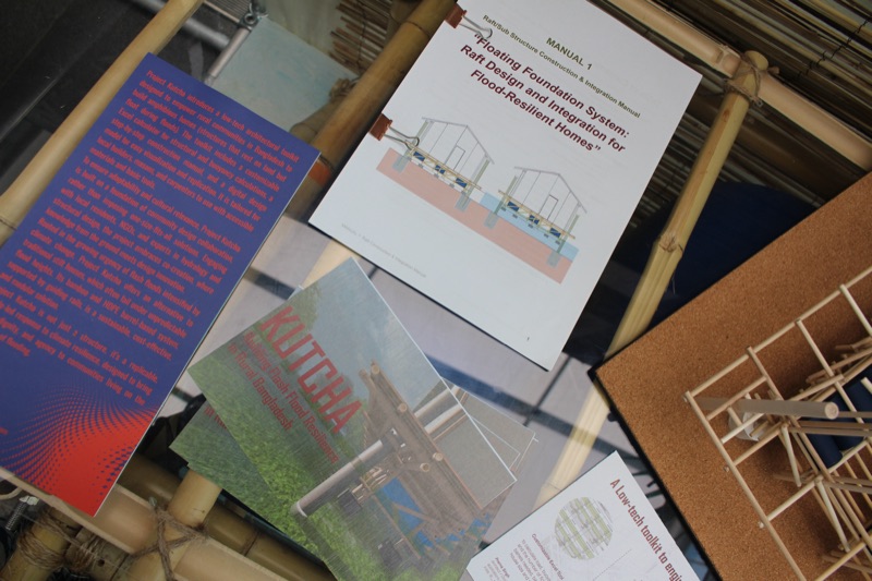 Printed construction manual and project cards lying on the exhibition stand